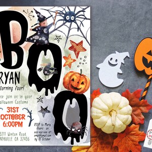 May include: Halloween-themed invitation with the word "BOO" in large black letters, featuring a witch, spider, and pumpkin illustrations. The invitation includes details for a Halloween party, including the date, time, and location.