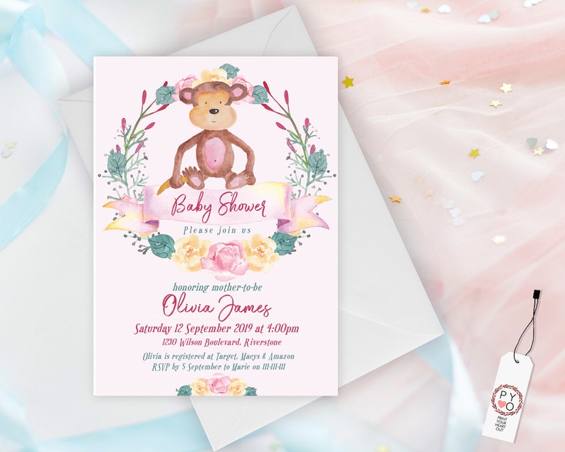 May include: Pink baby shower invitation with a watercolor illustration of a monkey wearing a flower crown. The text reads "Baby Shower Please join us honoring mother-to-be Olivia James Saturday 12 September 2019 at 4:00pm 1230 Wilson Boulevard, Riverstone Olivia is registered at Target, Macy's & Amazon RSVP by 5 September to Marie on III-II-III"