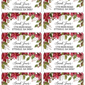 May include: A sheet of ten rectangular address labels featuring a watercolor illustration of red poinsettias and green holly leaves at the top. Each label displays the printed text Sarah Jones, 1770 River Road, Ettsville, GA 34567.