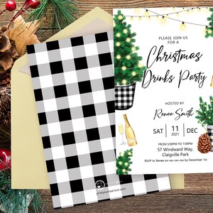 May include: Christmas Drinks Party invitation with a black and white buffalo check pattern on the back. The front features a Christmas tree illustration, champagne bottles, and the party details. The invitation is on a wooden background.