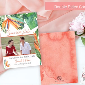 May include: A tropical-themed save the date card with a photo of a couple in front of a green field. The card features a watercolor design with colorful bird of paradise flowers and green leaves. The text on the card reads "Save Our Date" and "Saturday 19th April, 2021 Sarah & Peter are getting married."
