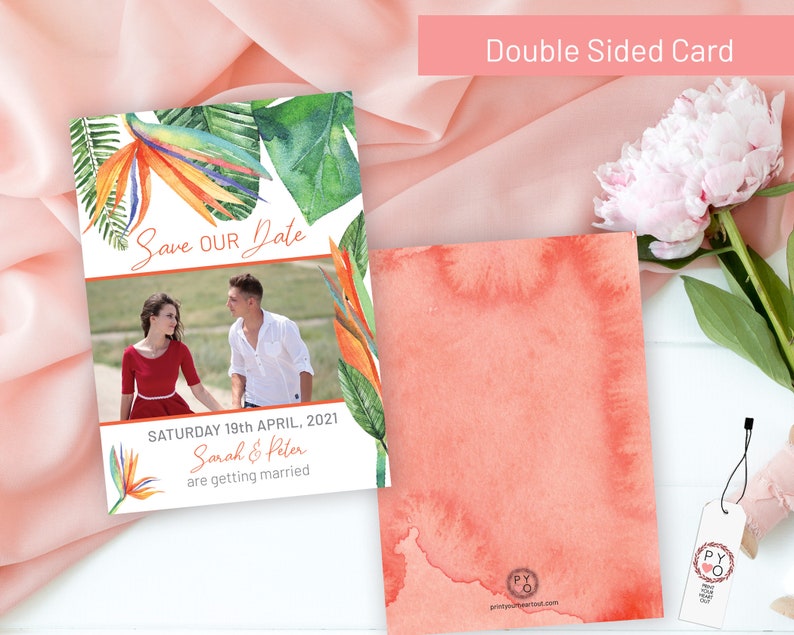 May include: A tropical-themed save the date card with a photo of a couple in front of a green field. The card features a watercolor design with colorful bird of paradise flowers and green leaves. The text on the card reads "Save Our Date" and "Saturday 19th April, 2021 Sarah & Peter are getting married."