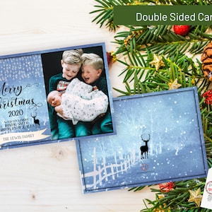 May include: Double-sided Christmas card with a family photo and winter scene. The front features "Merry Christmas 2020" with family names and deer silhouettes. The back shows a deer in a snowy landscape. Festive holiday card.