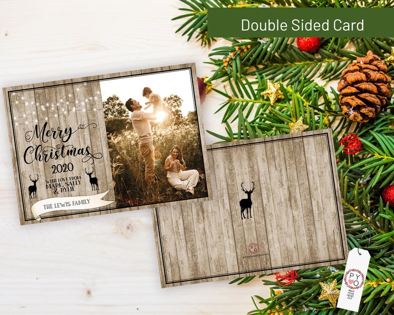 May include: Double-sided Christmas card with a rustic wood-grain design. The front features a family photo and the text "Merry Christmas 2020" with the family name. The back has a deer silhouette. Festive holiday card.