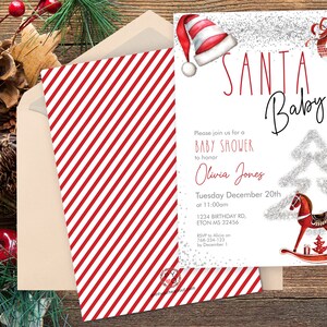 May include: A Christmas-themed baby shower invitation with a red and white striped pattern on the back. The front features the words "Santa Baby" with a Santa hat illustration. Details include the date, time, and RSVP information.