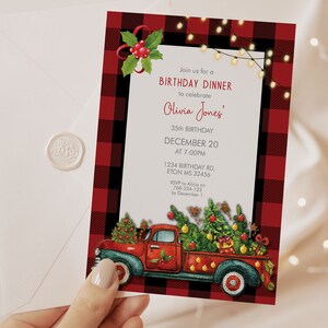 May include: A birthday dinner invitation with a red and black plaid border. The invitation features a red truck carrying Christmas trees. Text on the invitation reads "Join us for a Birthday Dinner to celebrate Olivia Jones' 35th Birthday, December 20 at 7:00 PM."