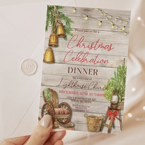 May include: A Christmas Celebration Dinner invitation with a rustic design. The invitation features watercolor illustrations of bells, a wagon, a lantern, and a Christmas tree. The text reads "Christmas Celebration Dinner" and includes event details.