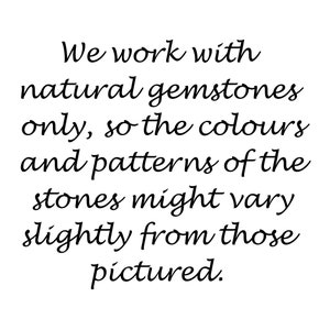 May include: White background with black text that reads: "We work with natural gemstones only, so the colours and patterns of the stones might vary slightly from those pictured."