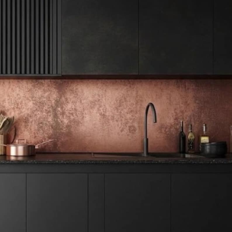 Matte black kitchen with bespoke copper splashback