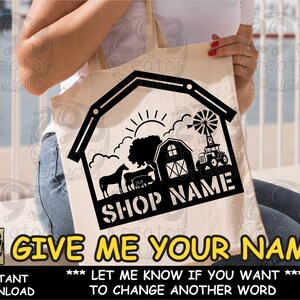 May include: A white tote bag featuring a black silhouette of a farm scene, including a barn, a tractor, and animals. The text "SHOP NAME" is printed on the bag. The text "GIVE ME YOUR NAME" is printed below the image. The text "*** LET ME KNOW IF YOU WANT *** TO CHANGE ANOTHER WORD" is printed below the text "GIVE ME YOUR NAME".