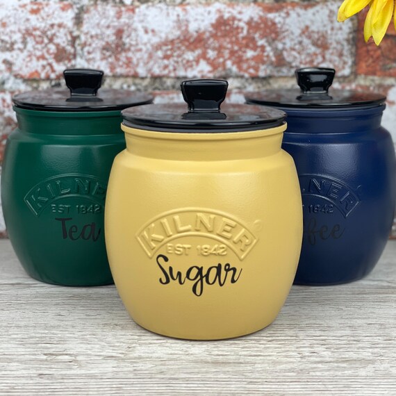 yellow tea coffee sugar canisters next
