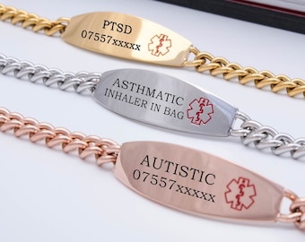 May include: Three medical alert bracelets with different colored chains and engraved medical information. The top bracelet has a gold chain and says "PTSD 07557XXXXX". The middle bracelet has a silver chain and says "ASTHMATIC INHALER IN BAG". The bottom bracelet has a rose gold chain and says "AUTISTIC 07557XXXXX".
