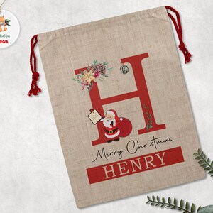 custom-name-santa-sack-flat-with-decoration-on-top