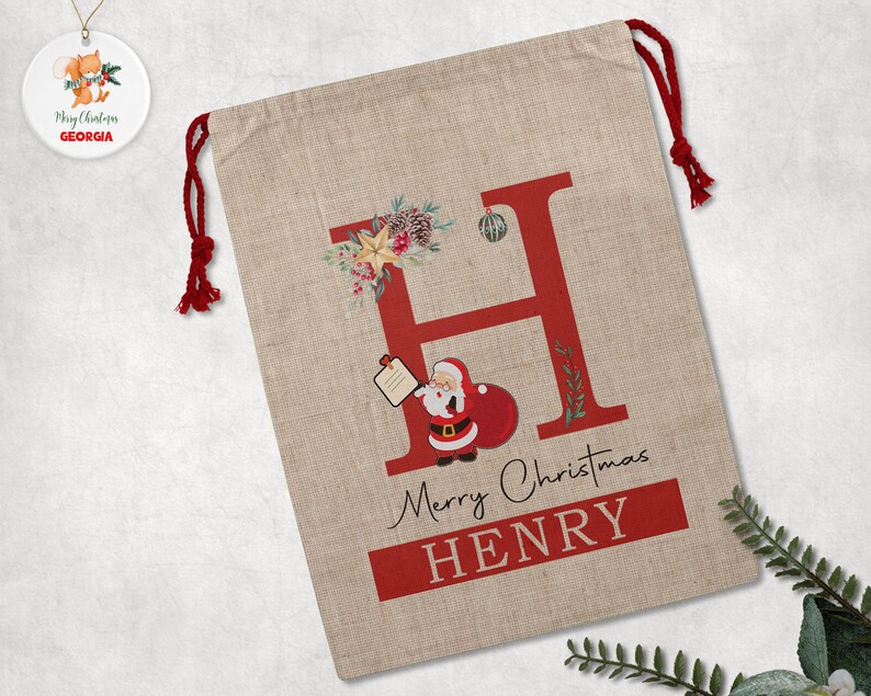 custom-name-santa-sack-flat-with-decoration-on-top