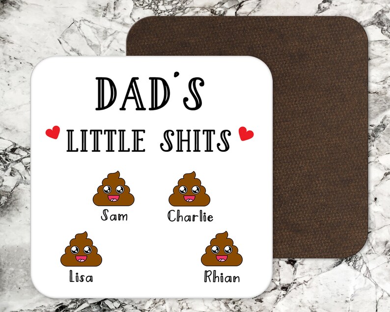 May include: A square white coaster with rounded corners featuring the black text DAD'S LITTLE SHITS, two red hearts, and four brown cartoon poop emojis with smiling faces. Below each emoji are the names Sam, Charlie, Lisa, and Rhian in black.