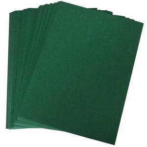 May include: A stack of 20 sheets of dark green cardstock paper.