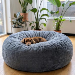 Orthopedic luxury dog bed with extra height, made of high-quality grey faux fur