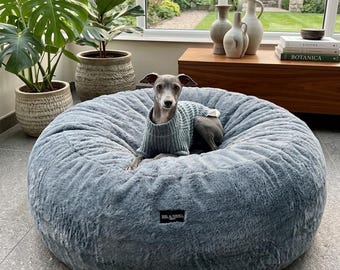 Orthopedic luxury dog bed with extra height, made of high-quality grey faux fur