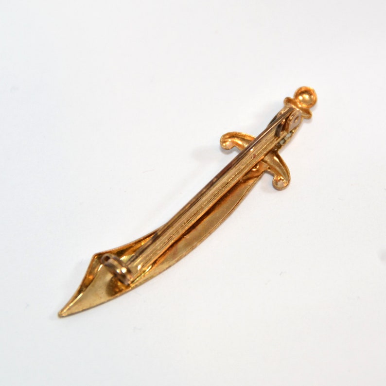 Oriental vintage brooch crumb sabers or sword