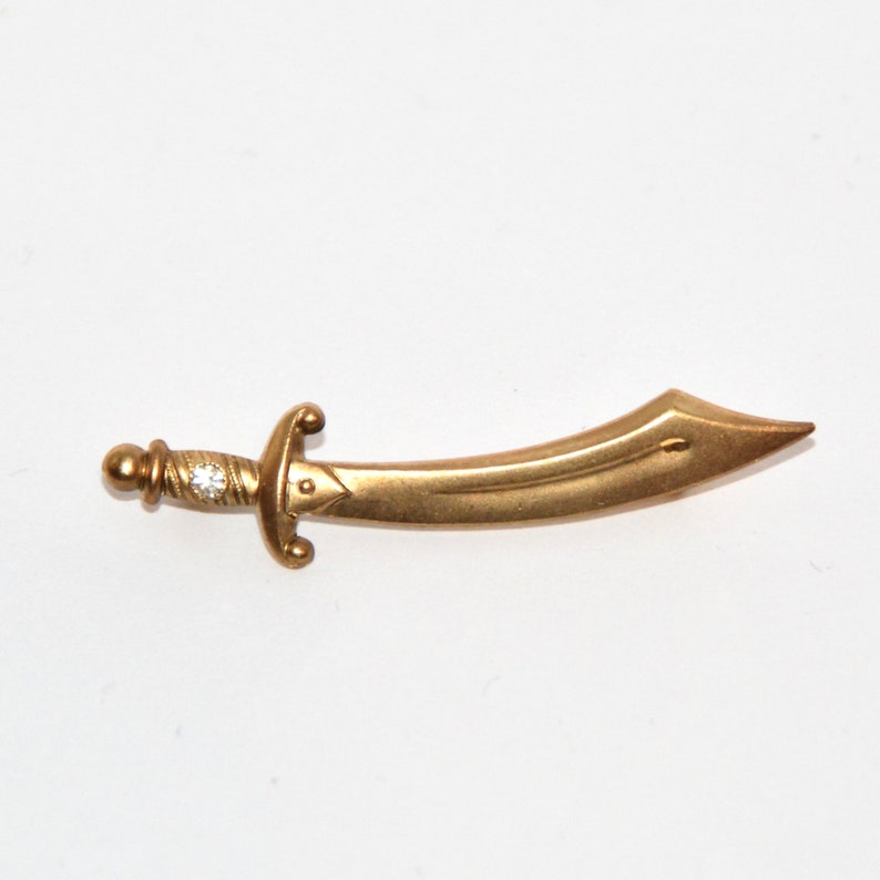 Oriental vintage brooch crumb sabers or sword