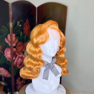 Golden copper pinup girl hairstyle vintage wig long waves side part 1940s 1950s