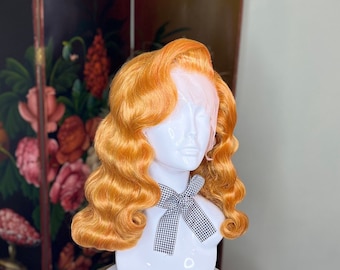 Golden copper pinup girl hairstyle vintage wig long waves side part 1940s 1950s
