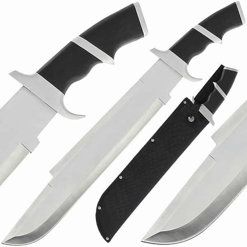 May include: A black and silver knife with a black leather sheath. The knife has a curved blade and a black handle with a silver stripe.