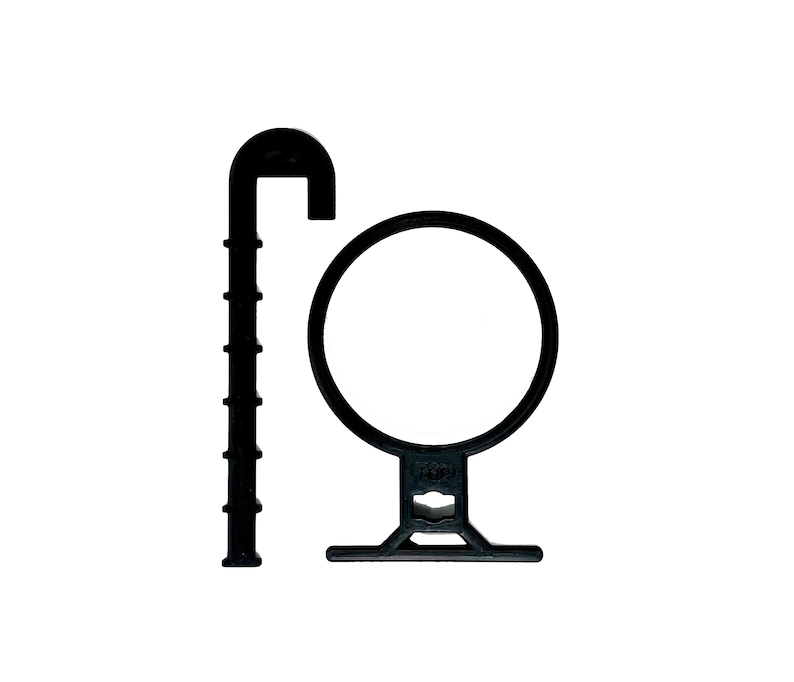 May include: Black plastic plant hanger with a hook and a ring for hanging a plant pot. The hanger has a small label that says "150".