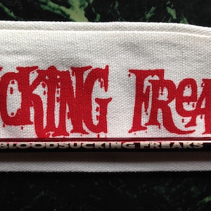 BLOODSUCKING FREAKS metal straw horror movie merch vestron vhs video store memorabilia cult exploitation gore