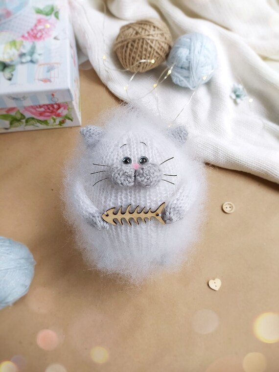 white cat doll