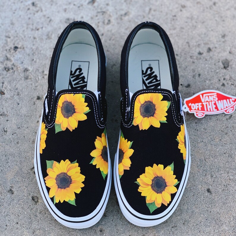 white vans with sunflowers