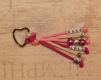 Schlüsselanhänger Taschenbaumler aus Paracord in Pink / Rosa / Creme personalisierbar mit Name Anhänger Key Chain Geschenk