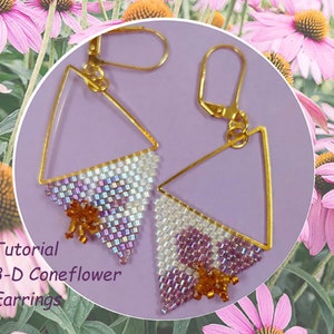 May include: A pair of gold triangle earrings with a beaded design that resembles a coneflower. The earrings are on a purple background with pink flowers.