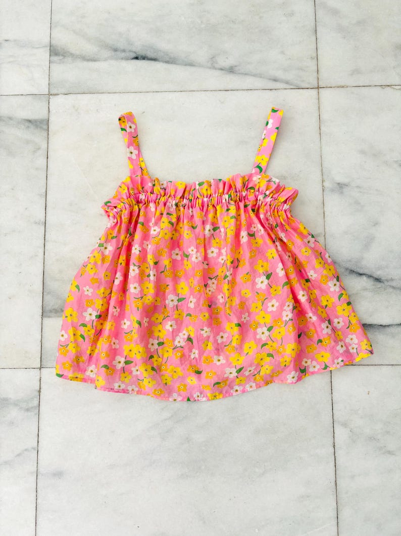 Babyhug Woven Sleeveless Top With Smock Detailing & Floral Print - White & Orange