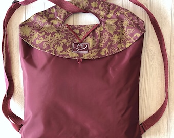 Large convertible burgundy backpack | foldable, water-repellent with interior pocket - charcoal canvas - ochre herbarium pattern / beach bag