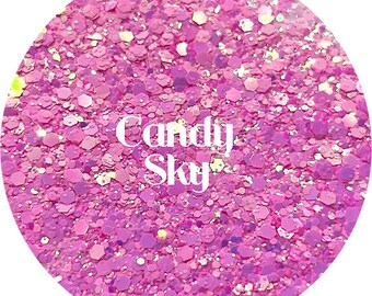 May include: Pink, purple, and iridescent glitter with the text "Candy Sky" in white.