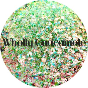 May include: A close-up of a jar of green, blue, and gold glitter with the text "Wholly Guacamole" on the front.