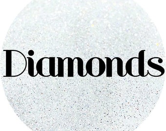 May include: A white circle with a sparkly texture and the word "Diamonds" in black bold letters.