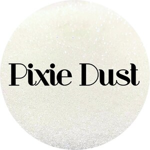 May include: White glitter with the text "Pixie Dust" in black.