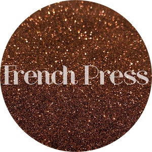 May include: A close-up of a brown glitter with a white text overlay that reads "French Press".