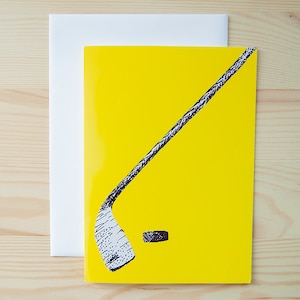 Hockey Stick en Puck Wenskaart - Goud en Zwart - Blank Binnen - Geweldig voor elke gelegenheid - Geweldig Voor Coach - Team - Fan - Cadeaukaart