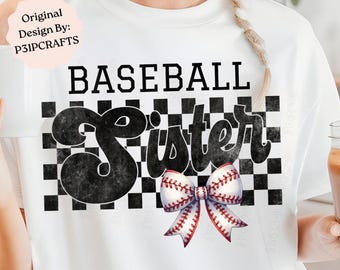 May include: A white t-shirt featuring a graphic design with the word BASEBALL in black block letters above the word Sister in a large black script font. A black and white checkered pattern sits behind the text, and a baseball-themed bow is below.