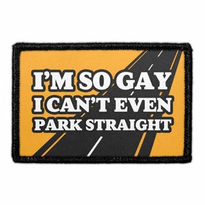 May include: A rectangular embroidered patch with a black border featuring a yellow background and a black road graphic with white lane markings. The text I'M SO GAY I CAN'T EVEN PARK STRAIGHT is printed in bold white letters with a black outline.