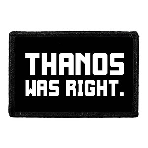 May include: A rectangular black patch with the white text "THANOS WAS RIGHT." The text is in a bold, sans-serif font. The patch has a black border.