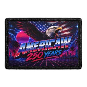 May include: A rectangular patch with a black border featuring a bald eagle, an American flag, and a retro synthwave landscape. The text reads AMERICAW 250 YEARS in a bold, stylized font. The design includes a sunset, palm trees, and a grid.