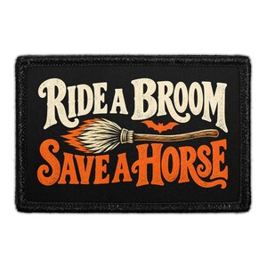 May include: A rectangular black patch with a stitched border featuring the text RIDE A BROOM in cream and SAVE A HORSE in orange. Between the lines is an illustration of a broom with orange flames and a small orange bat silhouette.