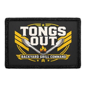 May include: A rectangular black patch featuring the white text TONGS OUT above a graphic of silver metal tongs and a small orange flame. Below, the text BACKYARD GRILL COMMAND is displayed in white, surrounded by yellow wings and stars.