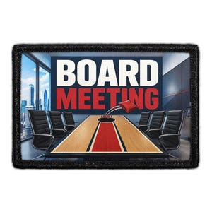 May include: A rectangular patch with a black border featuring a graphic of a conference table with a red center stripe and a hole, a red bean bag flying toward the hole, and the text BOARD MEETING in white and red against a city skyline background.