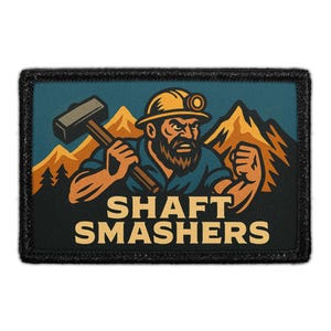 May include: Rectangular patch with a black border featuring a cartoon illustration of a bearded miner in a hard hat holding a sledgehammer. The background shows mountains and the text "SHAFT SMASHERS" in yellow.