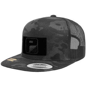 May include: Black camouflage print snapback hat with a mesh back. The hat features a black square patch with a white "P" logo. The brim has a gold stripe. The hat is labeled "The Classics Snapback" and "Since 1974".